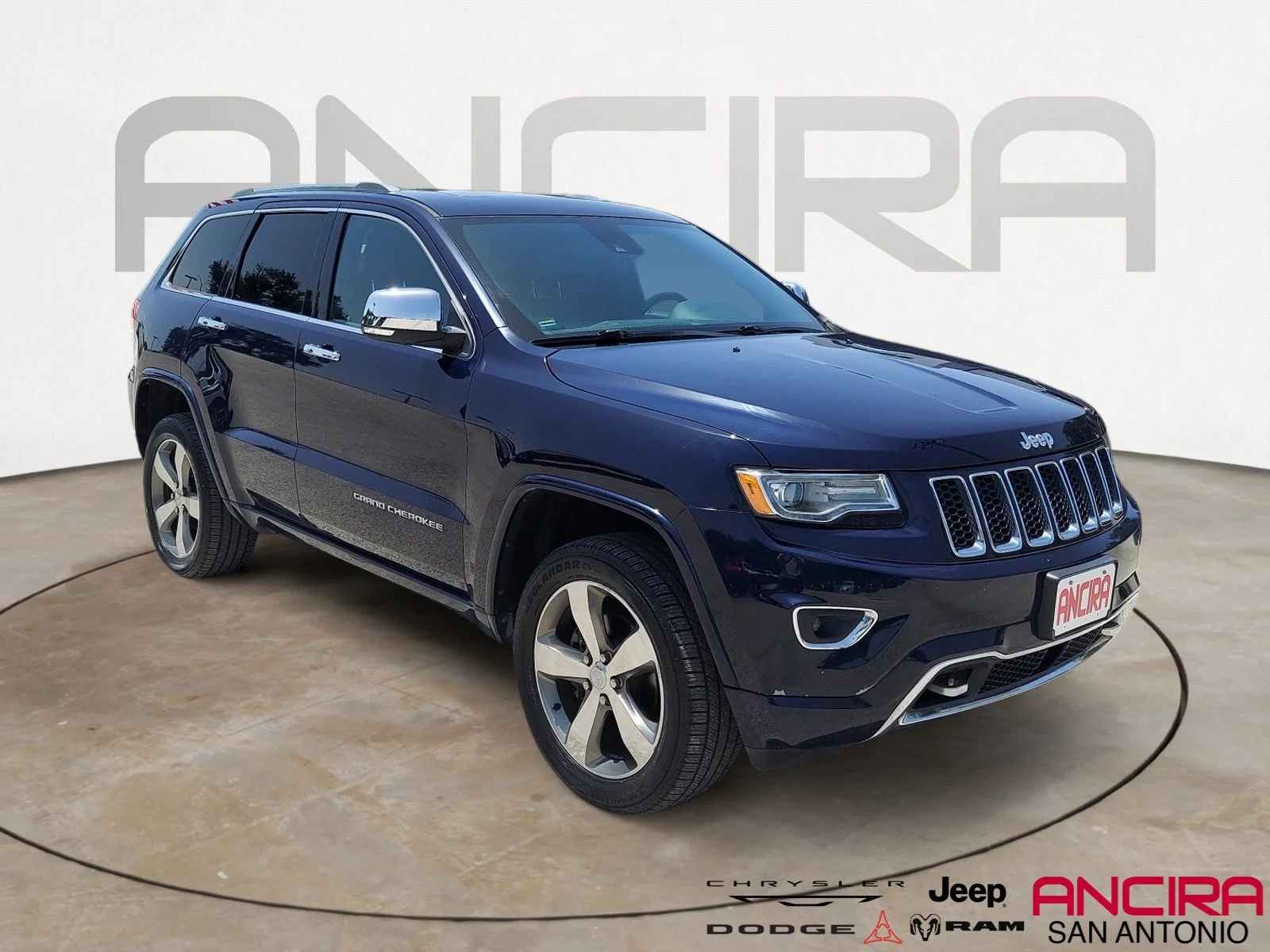 Used 2015 True Blue Pearlcoat Jeep Overland image 1