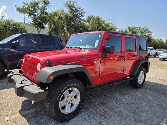 Used 2014 Firecracker Red Clear Coat Jeep Sport image 1