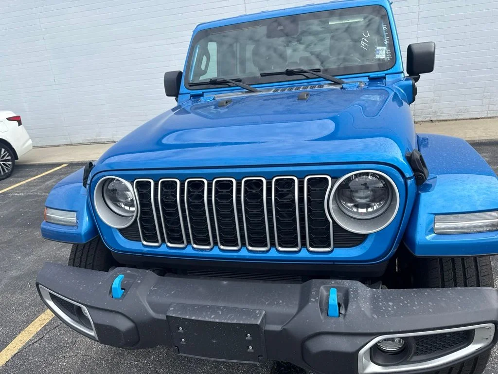 Used 2024 Jeep Wrangler 4xe Sahara 4XE with VIN 1C4RJXP63RW231976 for sale in Kansas City