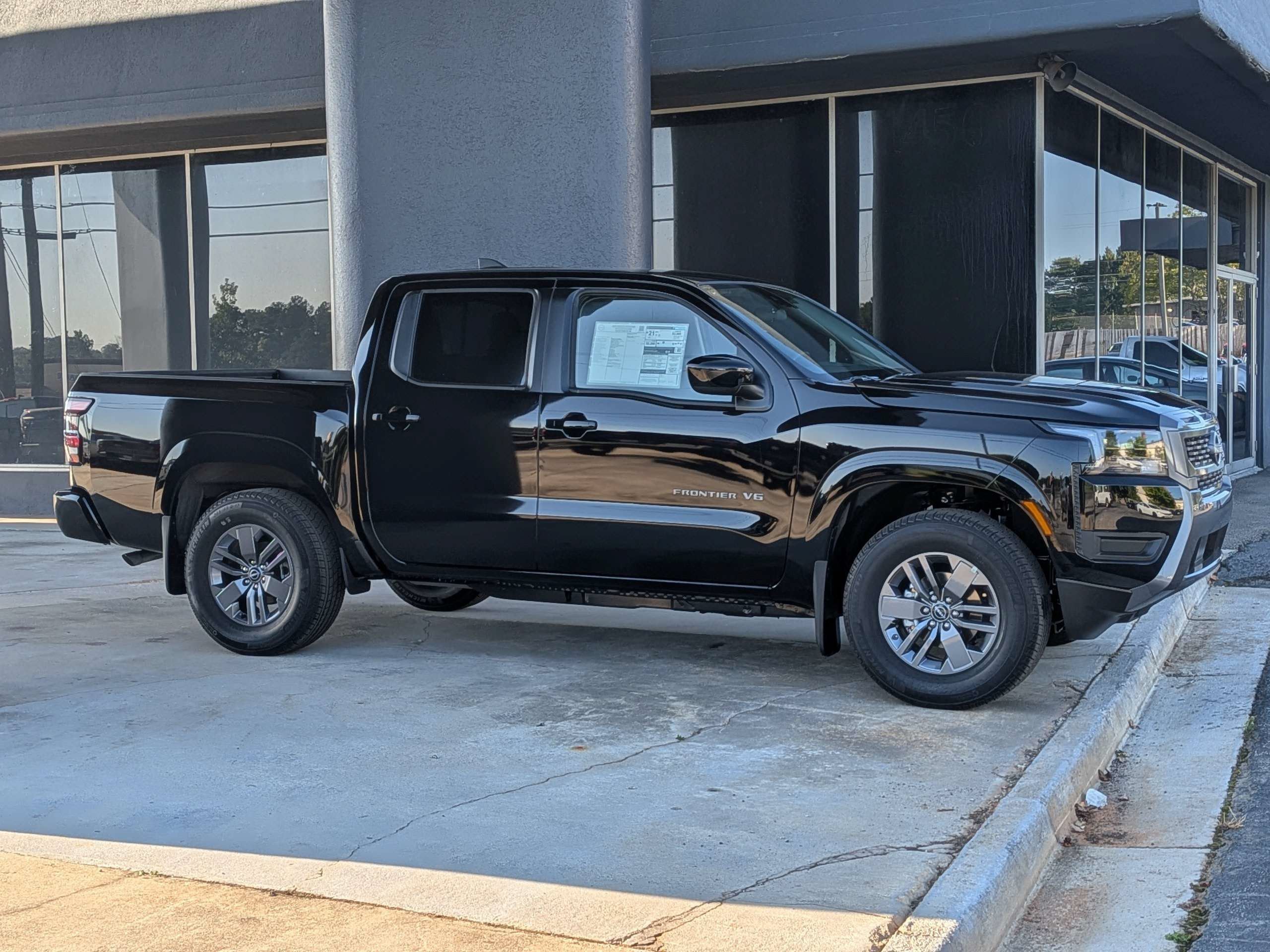 New 2027 Super Black Nissan Crew Cab SV image 1