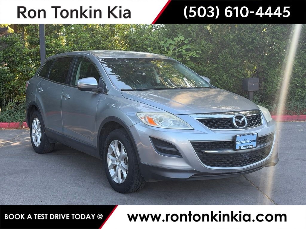 Used 2011 Liquid Silver Metallic Mazda Touring image 1