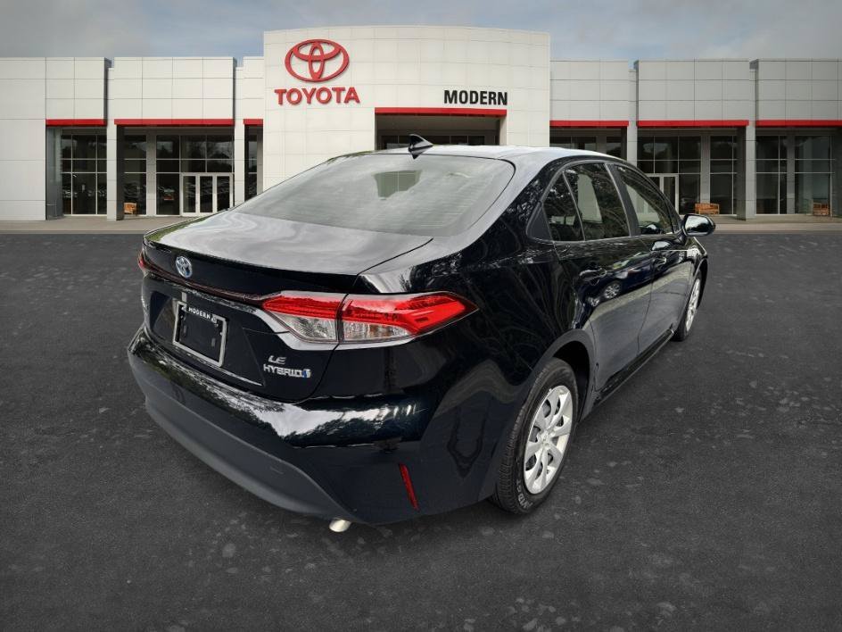 Used 2024 Midnight Black Metallic Toyota Hybrid LE image 7