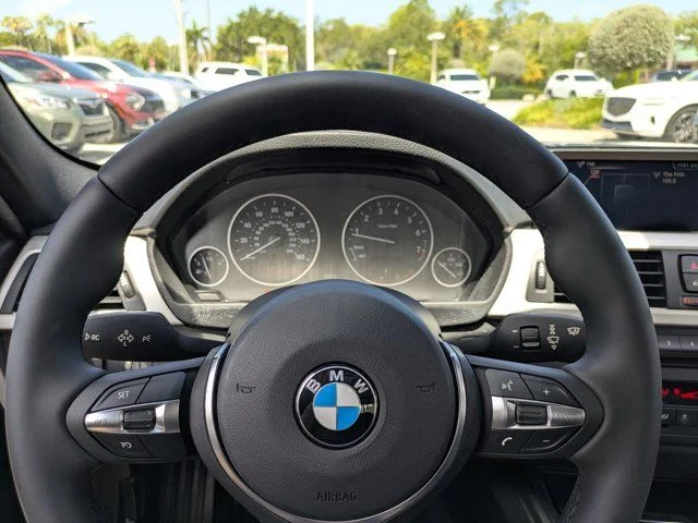 Used 2015 Mineral Gray Metallic BMW 320i xDrive image 25