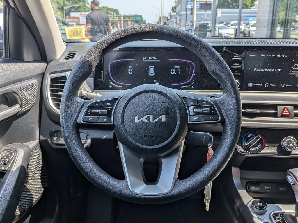 Used 2025 Blue Kia LX image 13