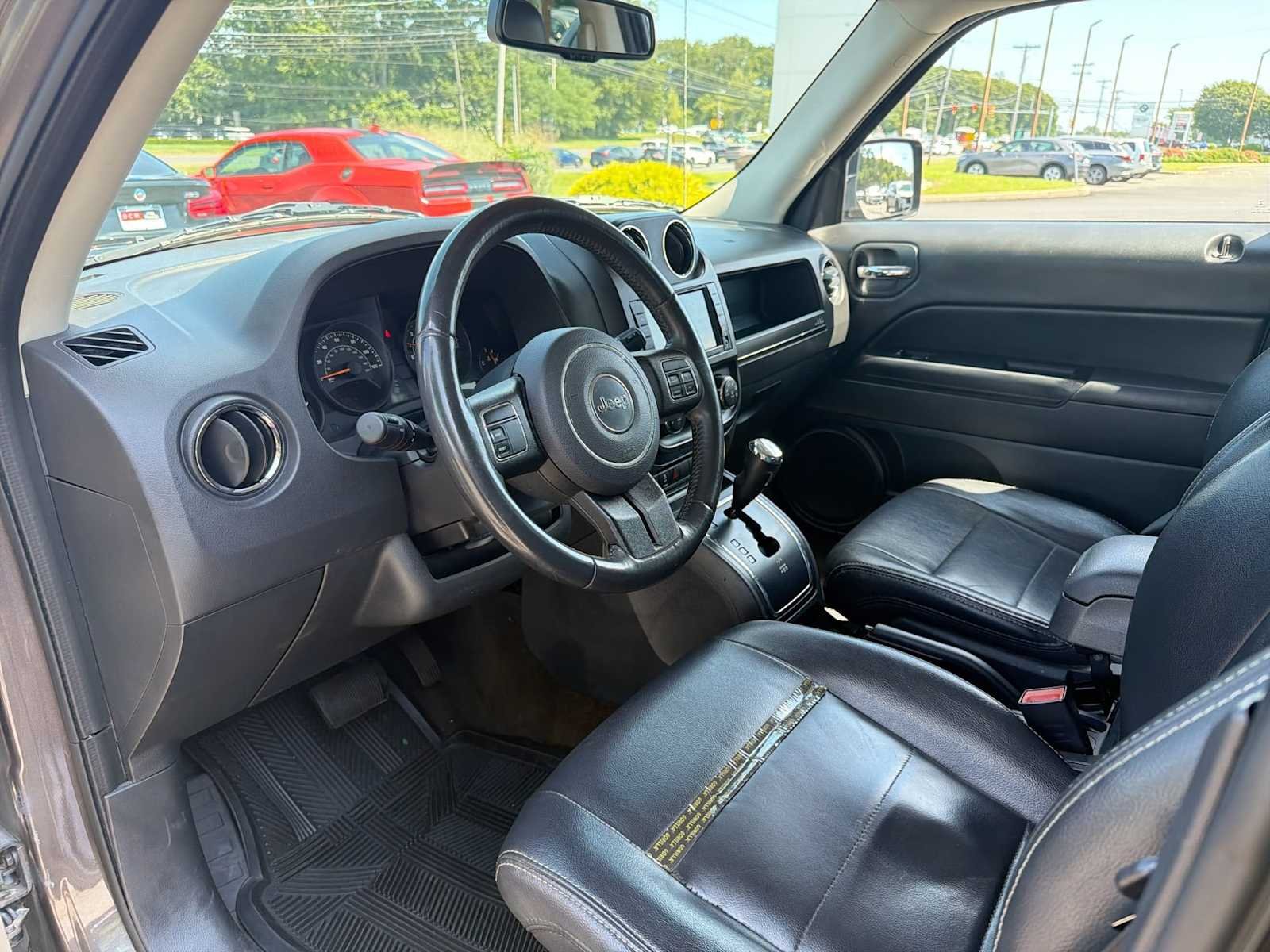 Used 2016 Granite Crystal Metallic Clearcoat Jeep High Altitude Edition image 10