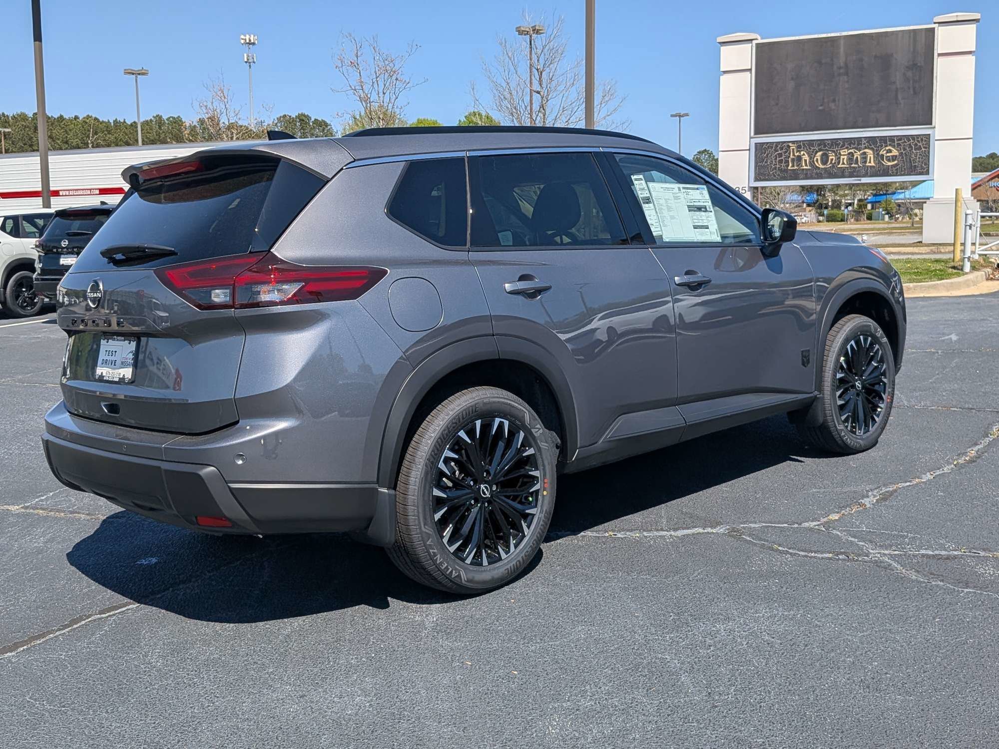 New 2026 Gray Nissan Dark Armor image 3