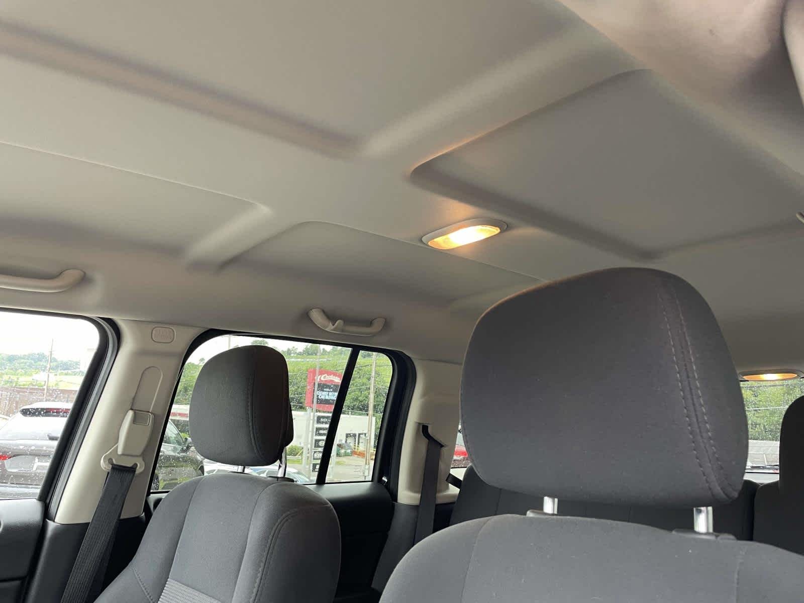 Used 2011 Blackberry Pearl Jeep Sport image 6
