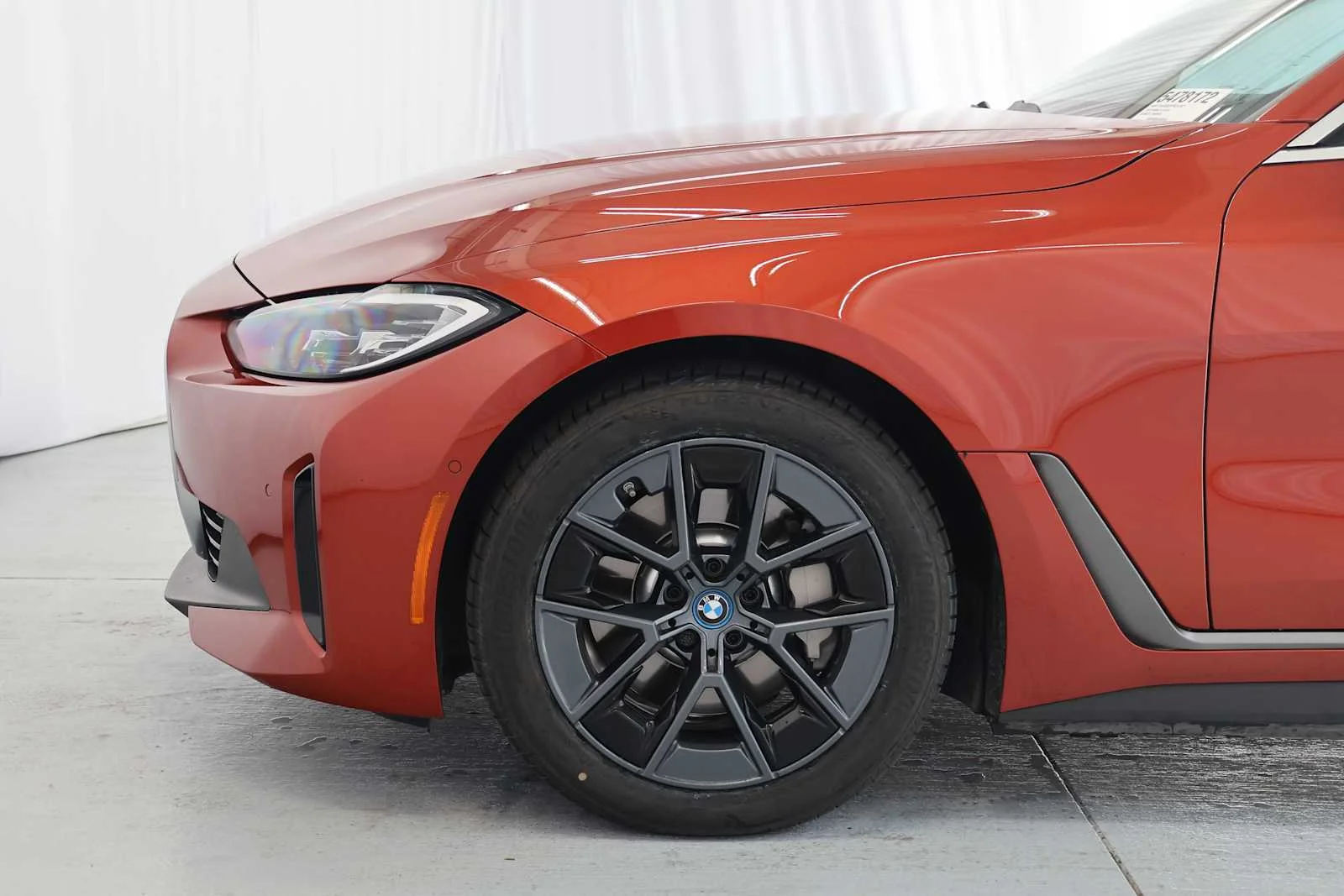 Certified Used 2023 Sunset Orange Metallic BMW eDrive40 image 7