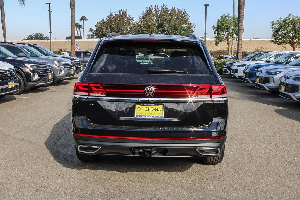 New 2026 Black Volkswagen SE w/Technology image 7