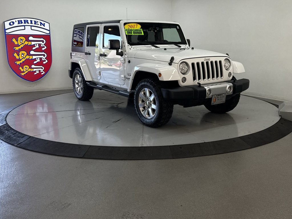 Used 2017 Bright White Clearcoat Jeep Unlimited Sahara image 1