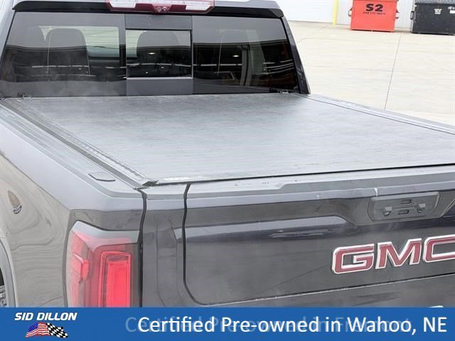 Used 2023 Titanium Rush Metallic GMC AT4X image 5