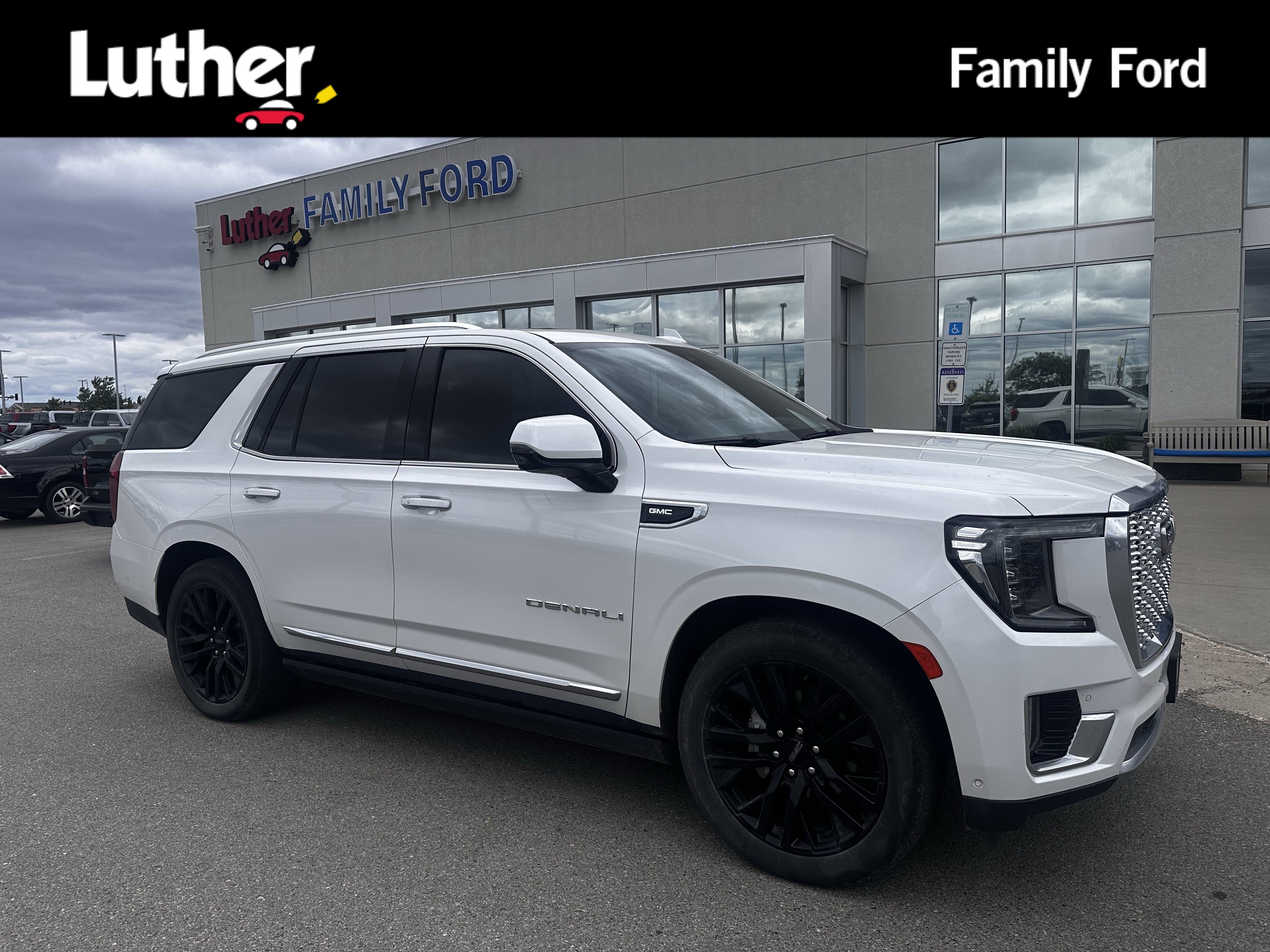 Used 2023 White Frost Tricoat GMC Denali image 1