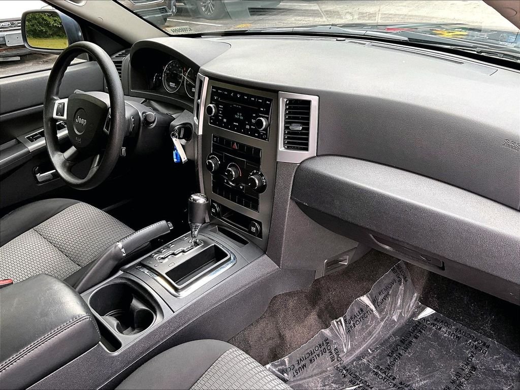 Used 2009 Modern Blue Pearlcoat Jeep Laredo image 14