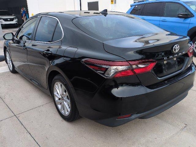 Used 2023 Midnight Black Metallic Toyota LE image 4