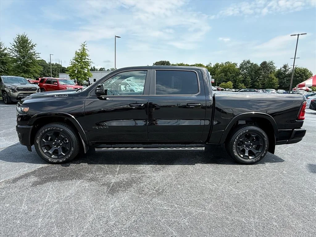 Used 2025 Diamond Black Crystal Pearlcoat RAM Big Horn/Lone Star image 1