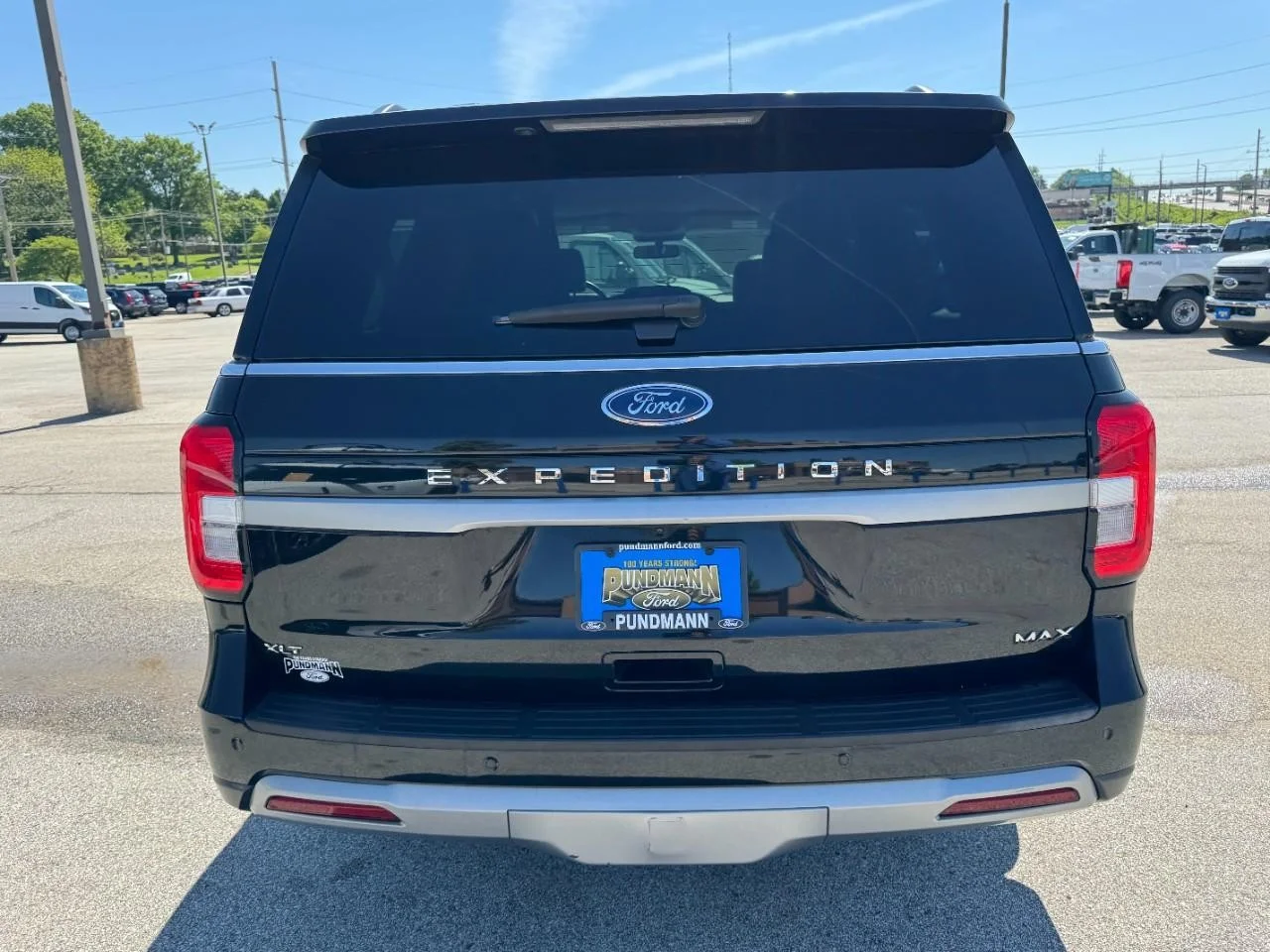 Used 2024 Agate Black Metallic Ford XLT 4x4 image 4