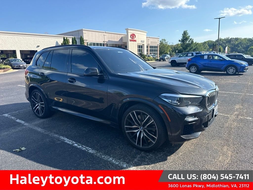 Used 2019 Black BMW xDrive40i image 1
