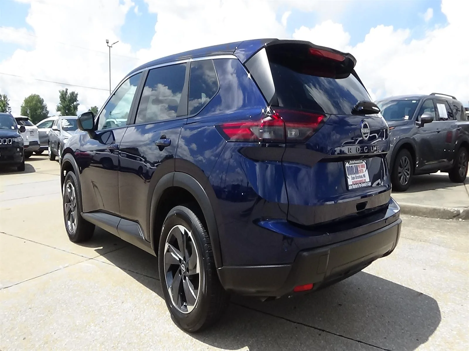Used 2025 Deep Ocean Blue Pearl (rcj) Nissan SV image 7