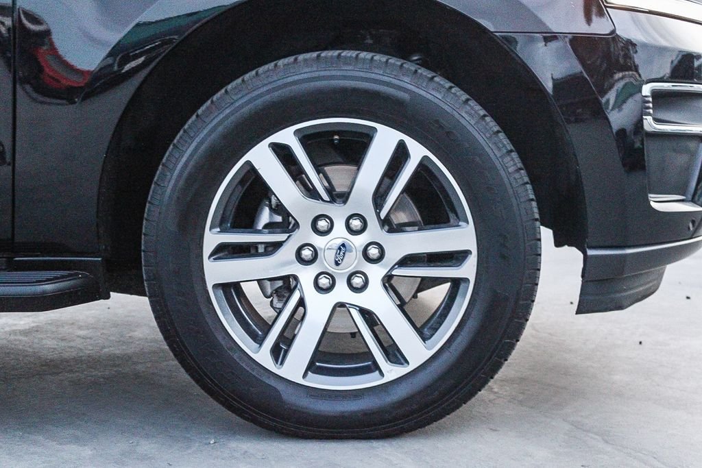 Used 2024 Black Metallic Ford Limited image 11