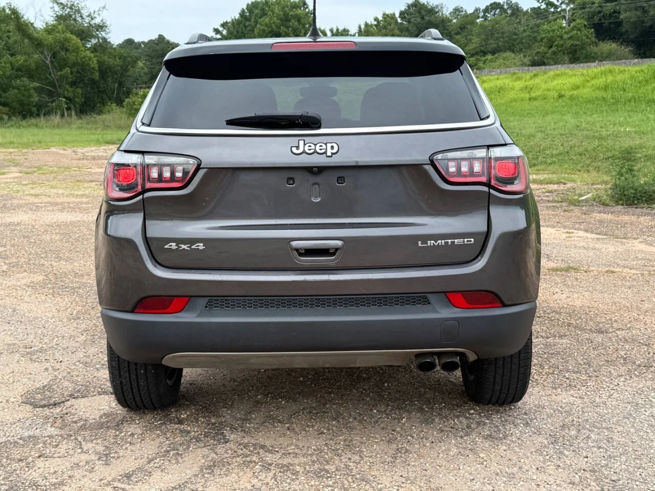 Used 2019 Charcoal Jeep Limited 4x4 4dr SUV image 4
