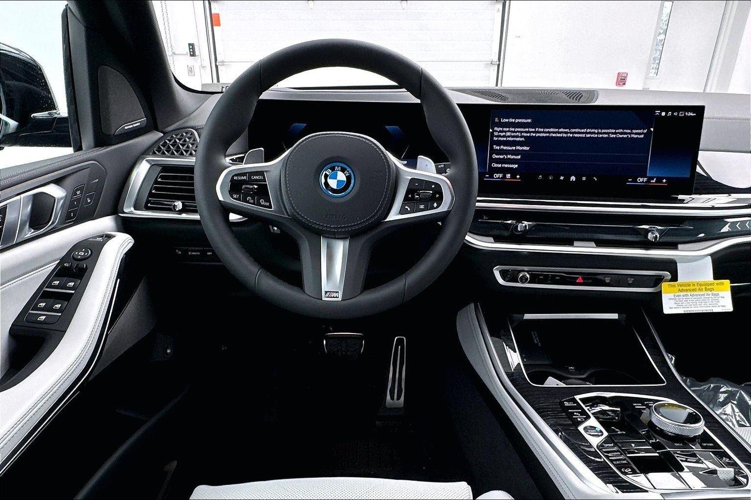 New 2026 Tanzanite Blue II Metallic BMW xDrive50e image 11