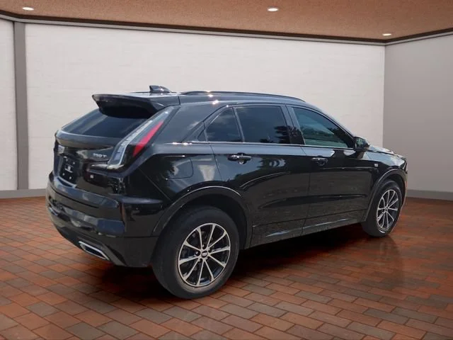 Used 2025 Stellar Black Metallic Cadillac Sport image 3