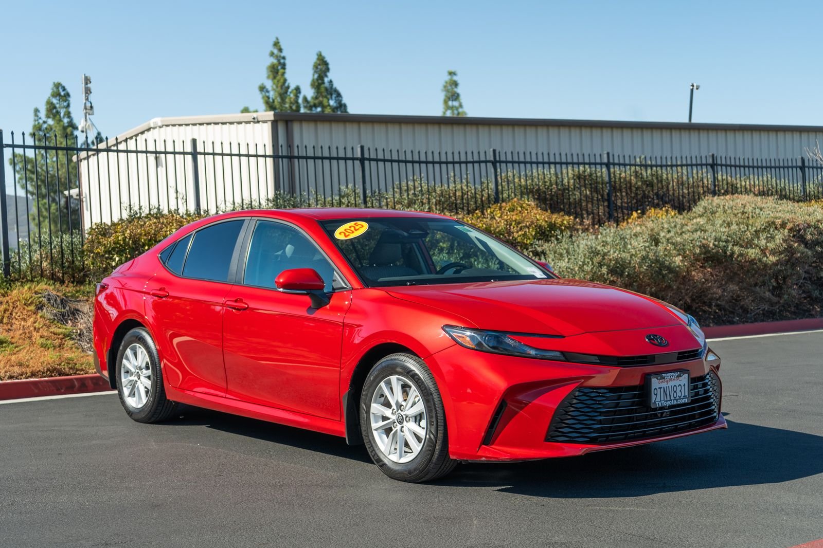 Certified Used 2025 Red Toyota LE image 3