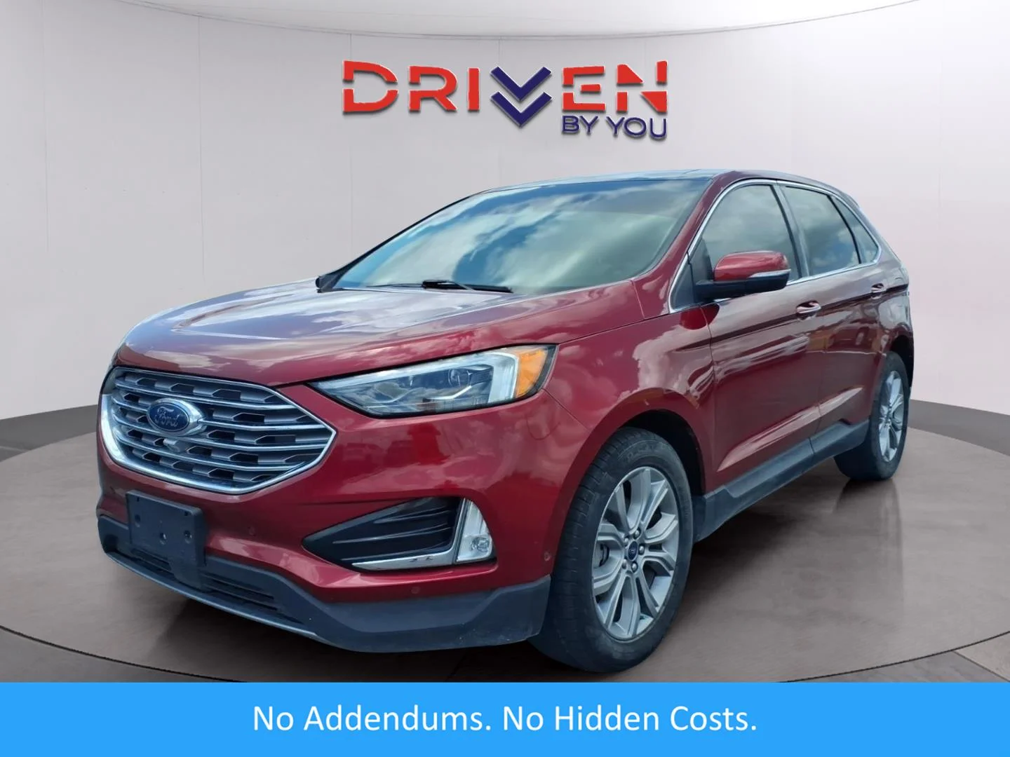 Used 2019 Ruby Red Metallic Tinted Clearcoat Ford Titanium image 1