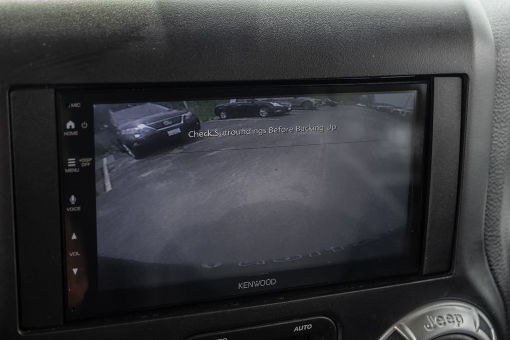 Used 2017 Black Jeep Unlimited Sahara image 18