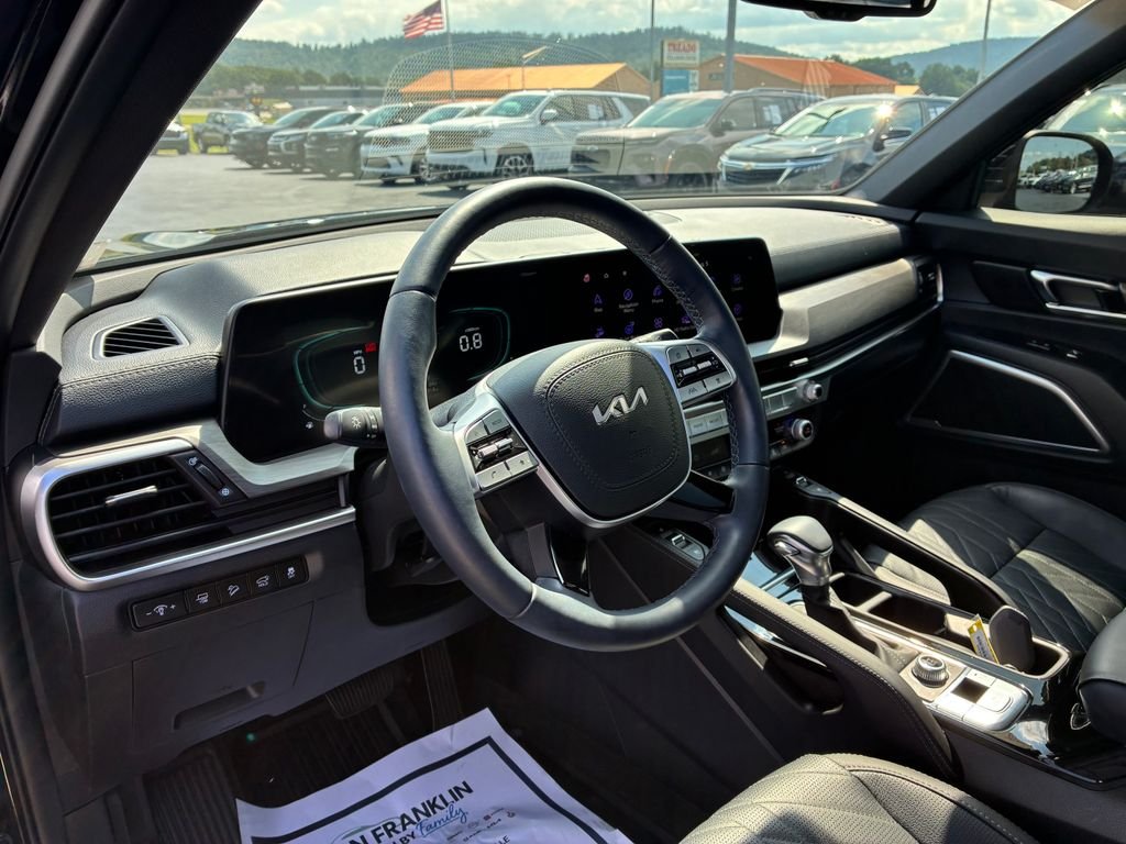 Certified Used 2025 Black Kia EX X-Line image 11