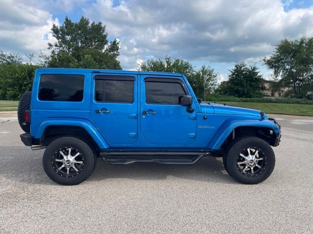 Used 2015 Blue Jeep Unlimited Sahara image 2