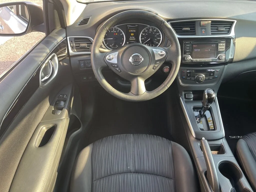 Certified Used 2018 Brilliant Silver Nissan SV image 2