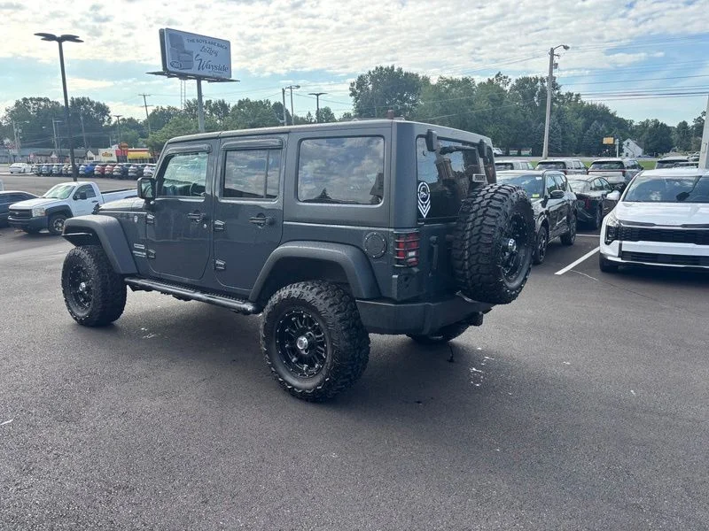 Used 2017 Black Jeep Unlimited Sport image 6