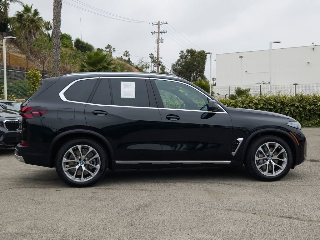 Certified Used 2024 Black Sapphire Metallic BMW xDrive50e image 4