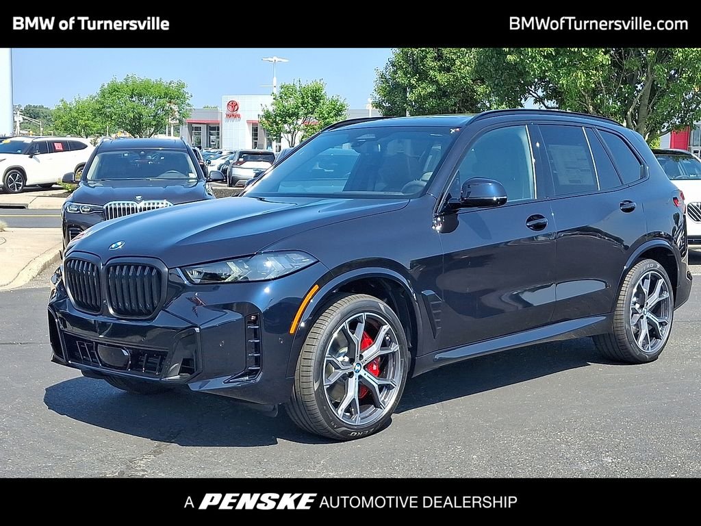 New 2026 Carbon Black Metallic BMW xDrive40i image 1