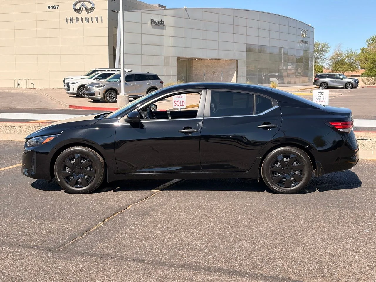 Used 2025 Super Black Nissan S image 2