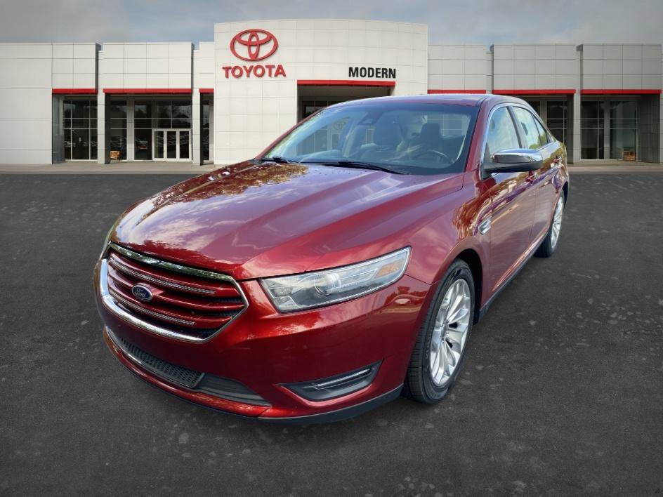 Used 2014 Ruby Red Metallic Ford Limited image 1
