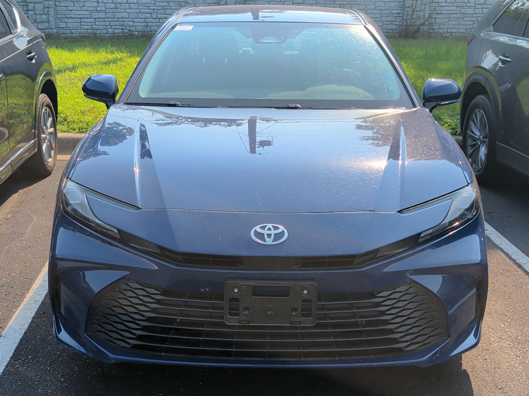 Used 2026 Reservoir Blue Toyota LE image 8