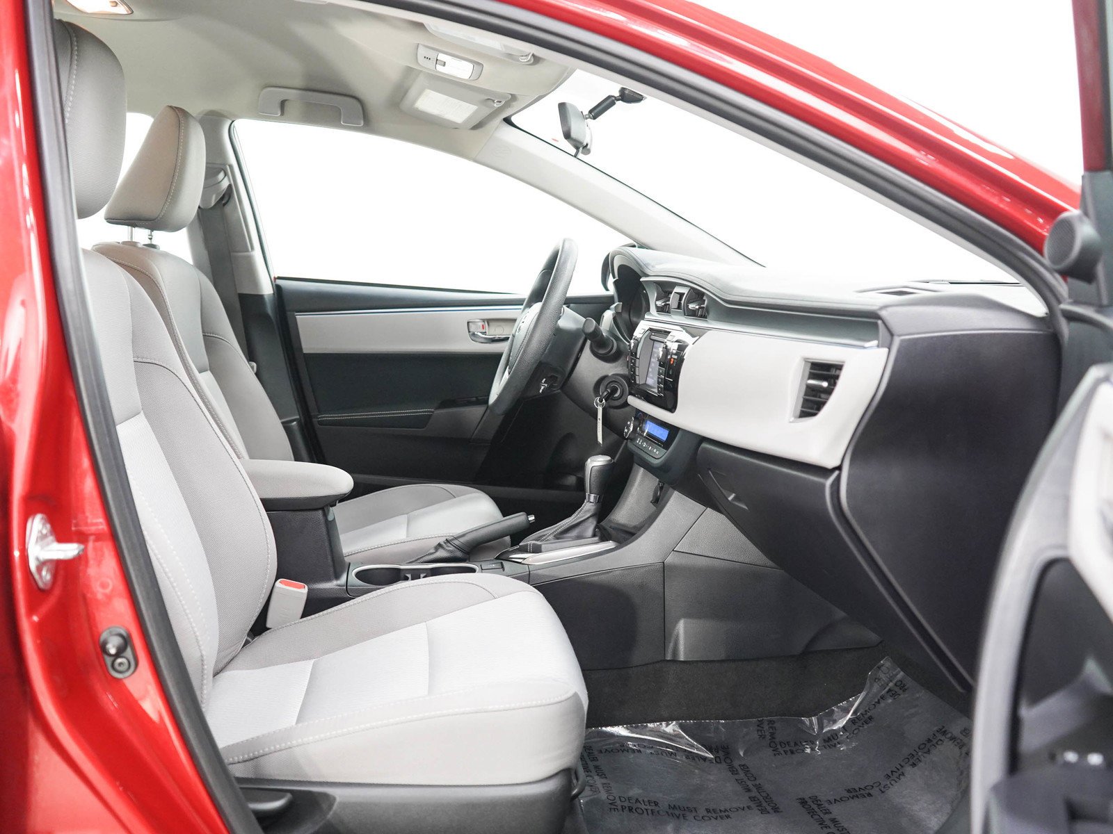 Used 2016 Barcelona Red Metallic Toyota LE image 11