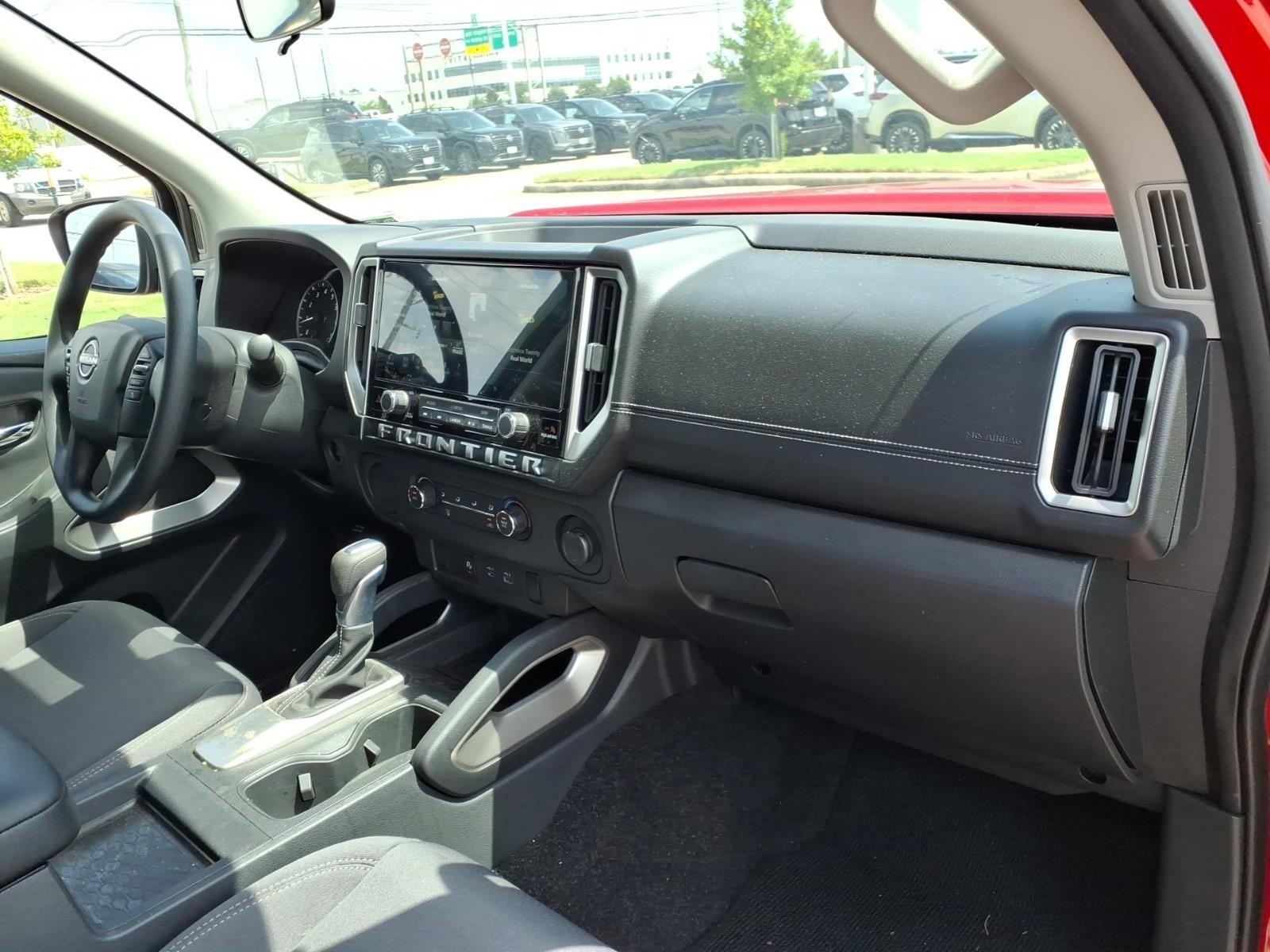 2026 Nissan Frontier SV Red at Robbins Nissan