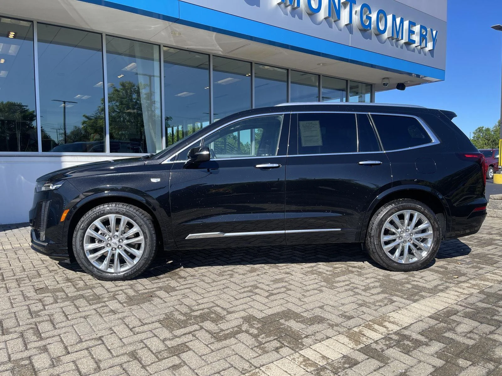 Used 2024 Stellar Black Metallic Cadillac Premium Luxury image 2