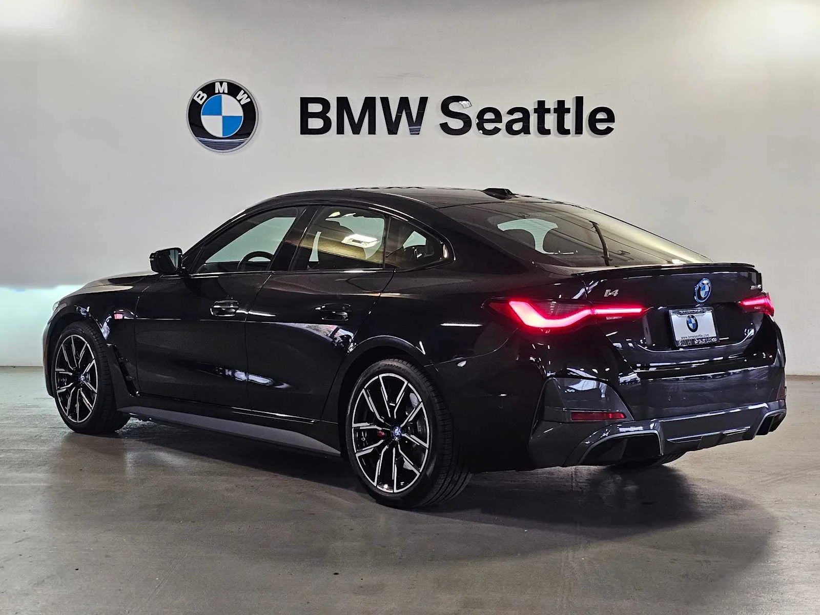 Certified Used 2023 Black Sapphire Metallic BMW eDrive40 image 4
