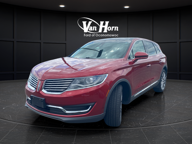 Used 2016 Ruby Red Metallic Lincoln Reserve image 3