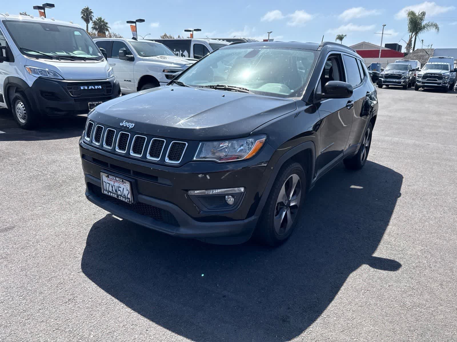 Used 2017 Diamond Black Crystal Pearlcoat Jeep Latitude image 1