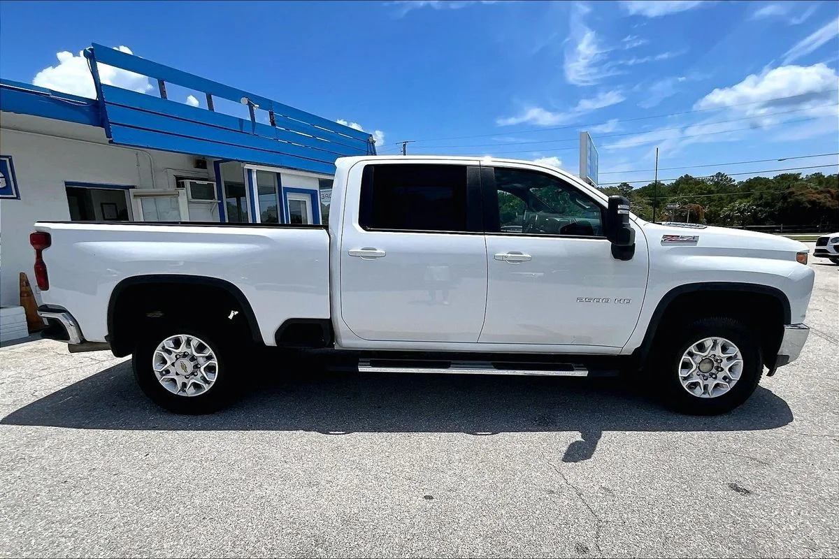 Used 2023 White Chevrolet 4WD Crew Cab Standard Bed LT image 31