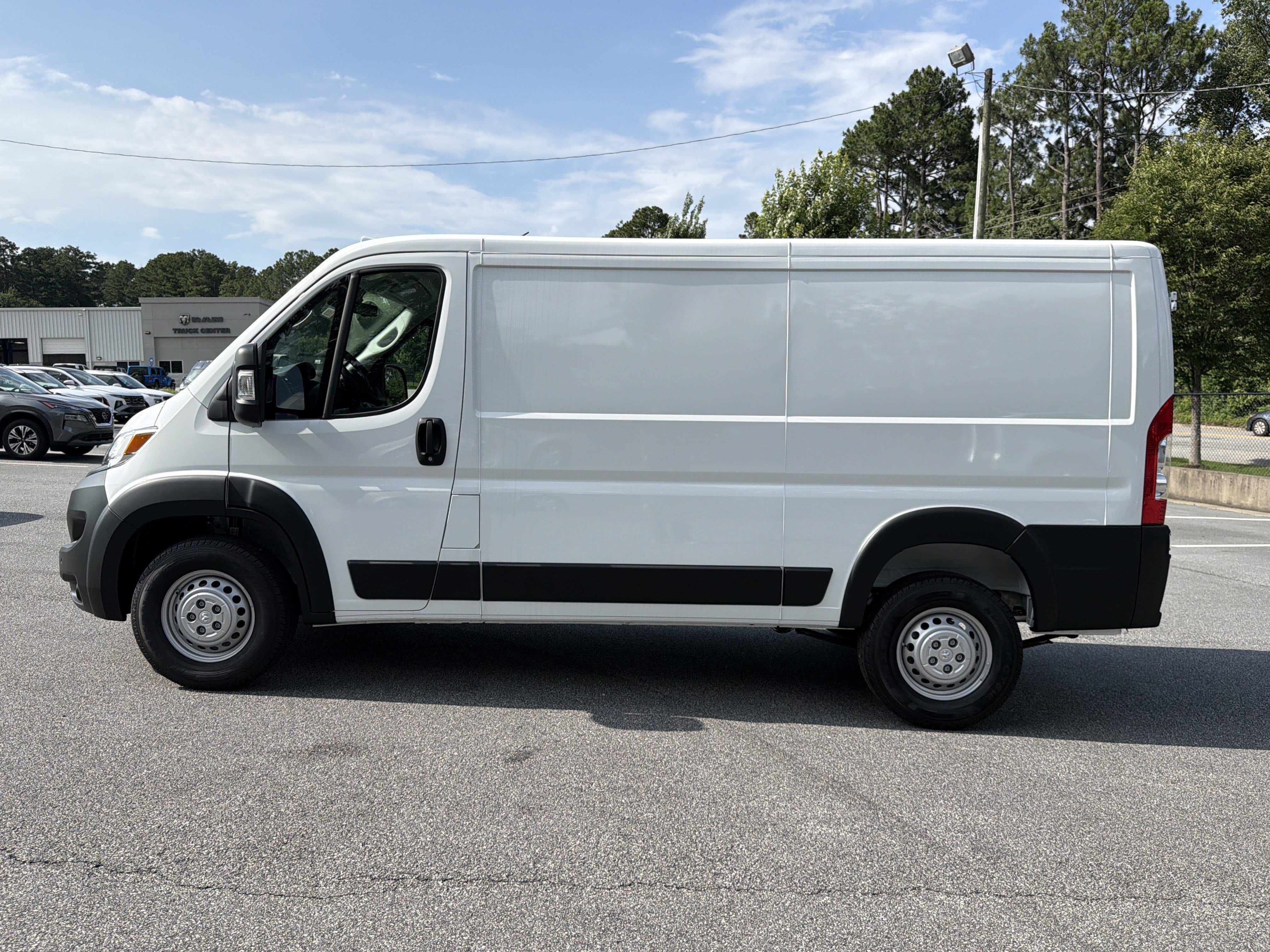 New 2026 Bright White Clearcoat RAM Low Roof image 4