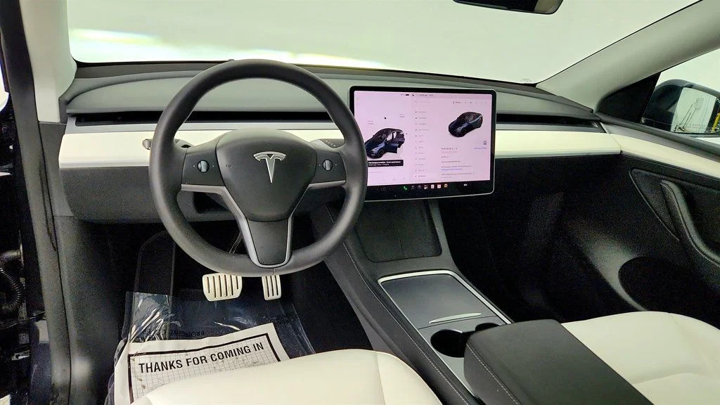 Used 2024 Stealth Grey Tesla Performance AWD w/ White & Black Interior image 12
