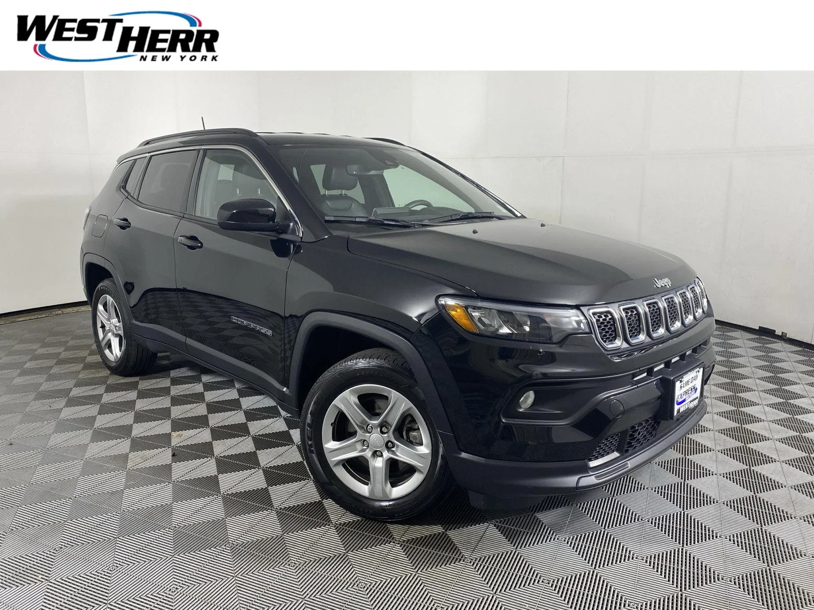 Used 2023 Diamond Black Crystal Pearlcoat Jeep Latitude image 1