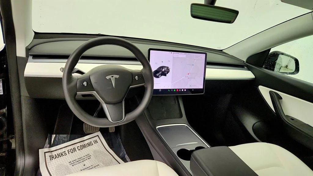 Used 2021 Solid Black Tesla Long Range AWD w/ White/Black 7-Seat Interior image 12