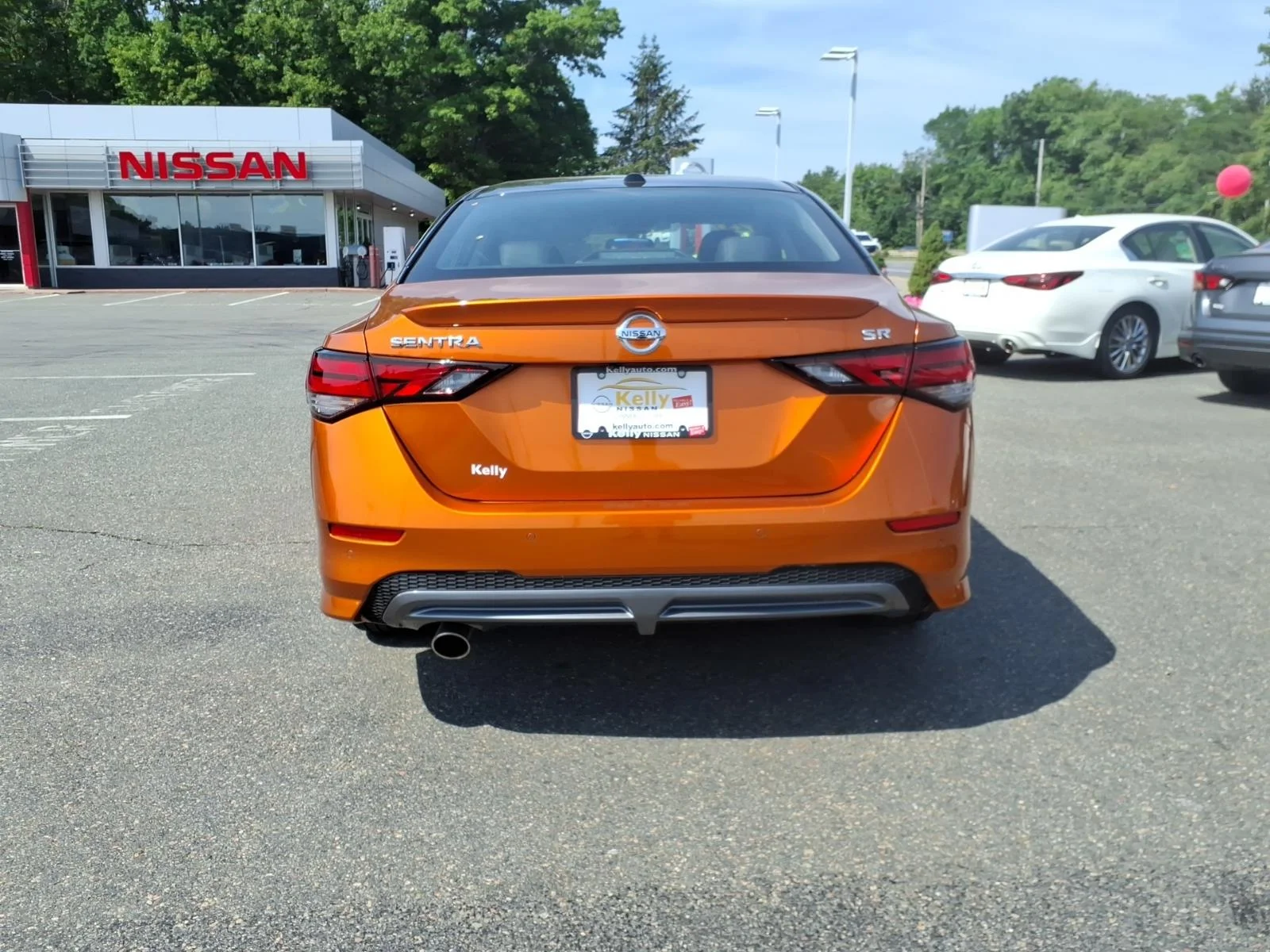 Certified Used 2023 Monarch Orange Metallic/Super Black Nissan SR image 6